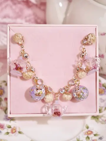 ข้อมือกาชากลมกระต่ายม่วง Floral Teapot