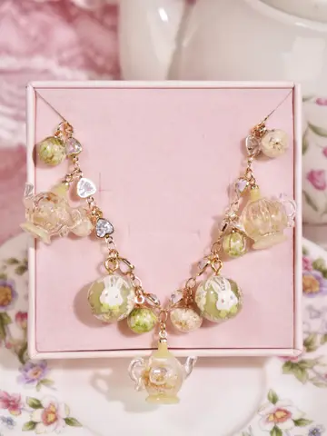 ข้อมือกาชากลมกระต่ายเขียวคัสตาร์ด Floral Teapot