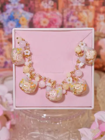 ข้อมือหัวแมวขาวครีมน้องหมาดอกไม้