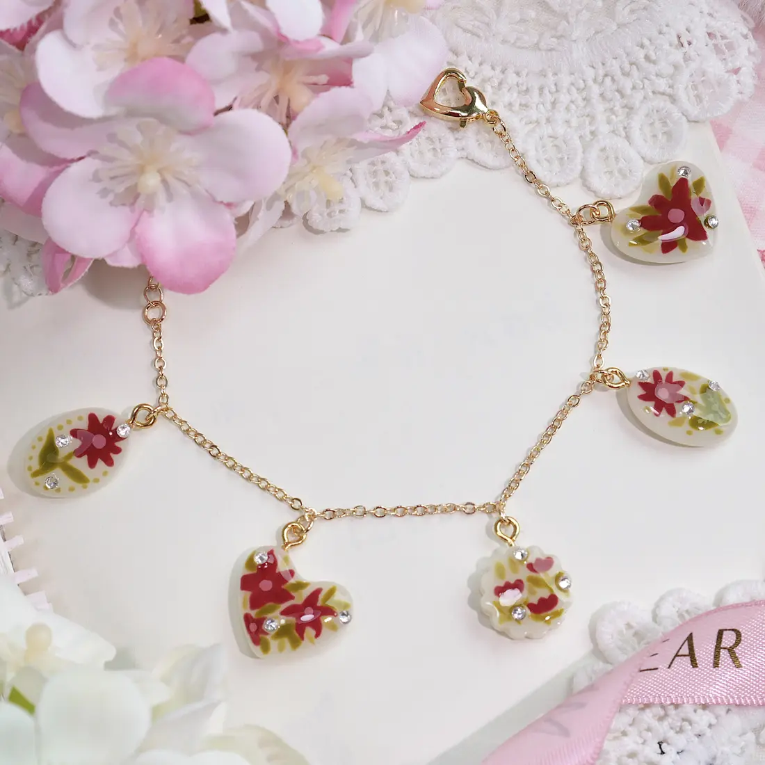 ข้อมือใจทรงรีดอกไม้แดง สร้อยข้อมือ MIMEAR