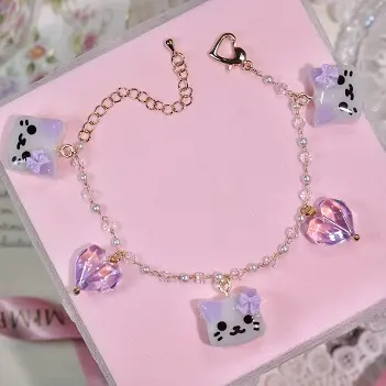 ข้อมือสกุชชี่แมวม่วงเพชร สร้อยข้อมือ MIMEAR