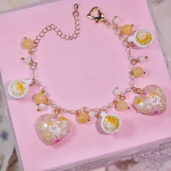 ข้อมือกระต่ายแก้วชาเหลือง สร้อยข้อมือ MIMEAR