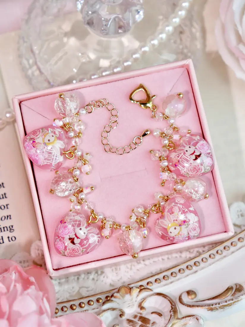 ข้อมือหัวใจชมพูพีชกระต่ายขาวหมวกเหลือง สร้อยข้อมือ MIMEAR