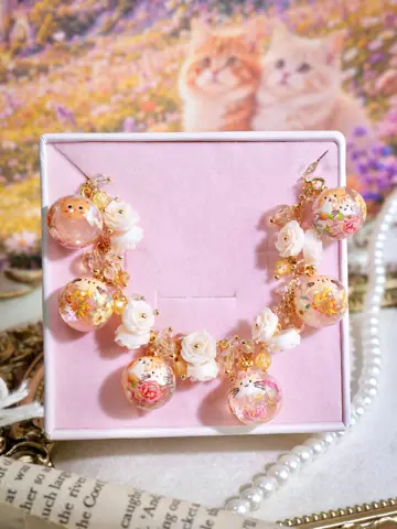 ข้อมือกลมแมวดอกไม้ส้ม