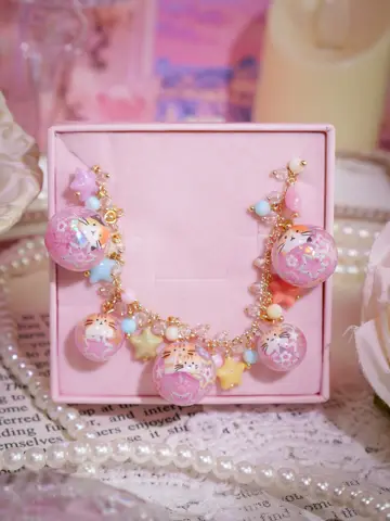 ข้อมือกลมชมพูแมวส้ม
